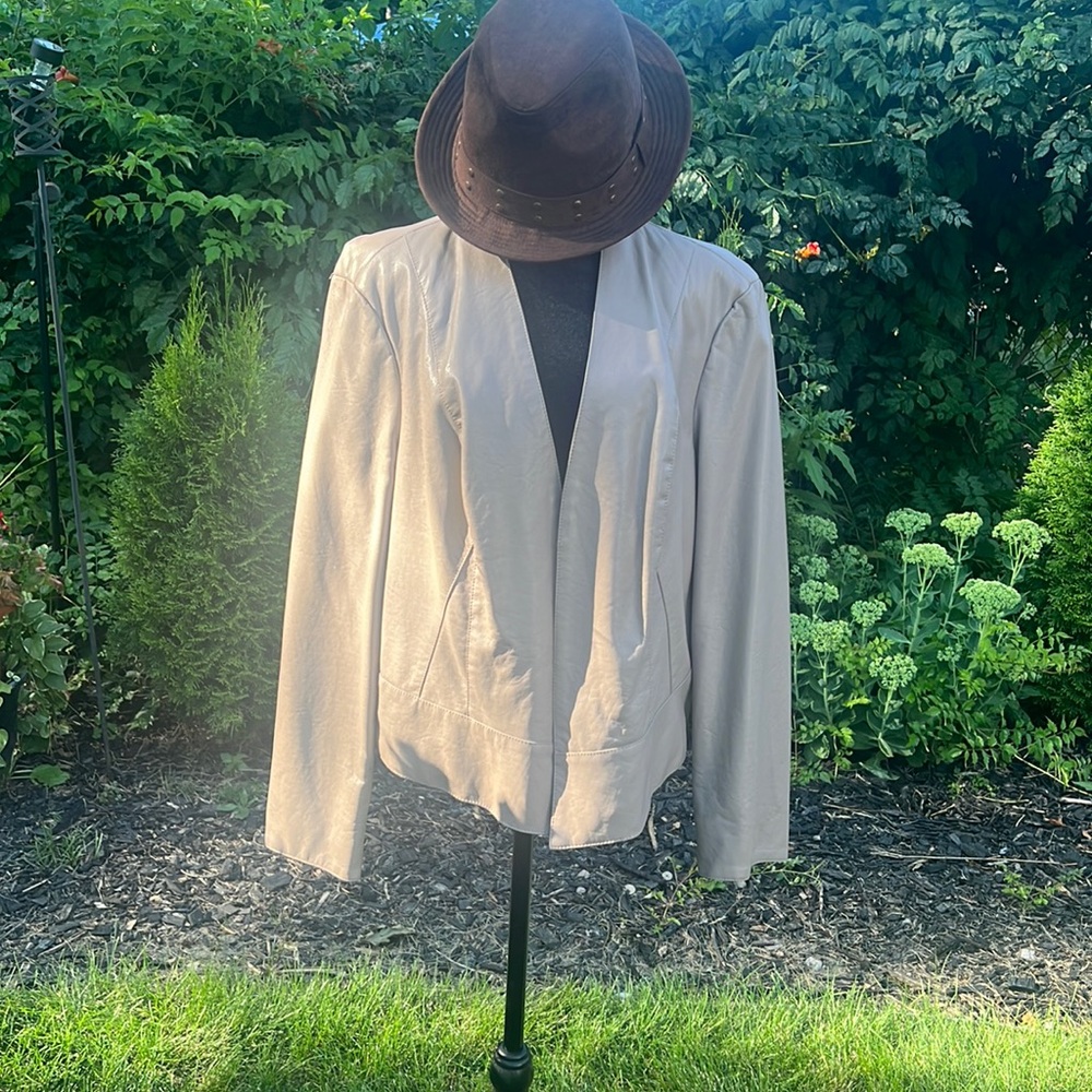 Ladies tan leather jacket,